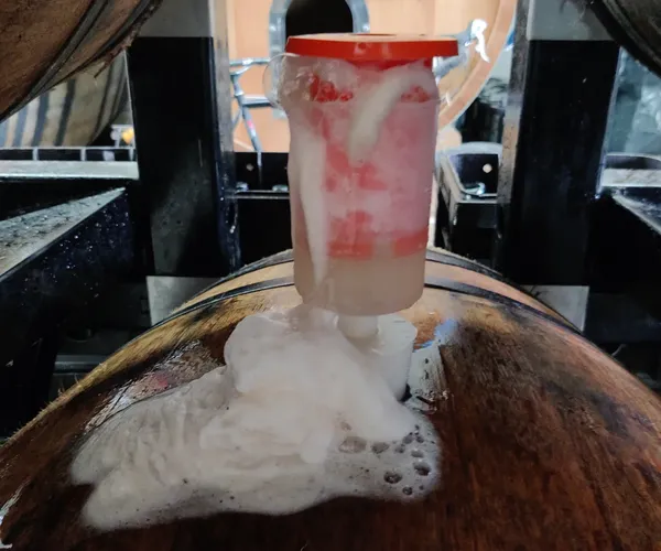 Refermentation foam spilling from a cask